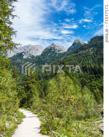 Walk in the valley Klausbachtal in the Berchtesgaden Alps, Germany 71037571