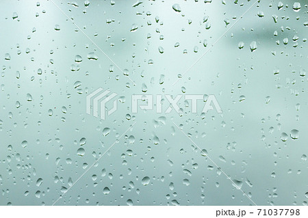 Water drop on glass window background. Water drop on glass window background. 71037798