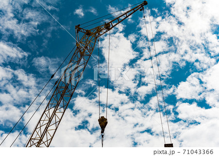 Construction crane against the sky Construction crane against the sky 71043366