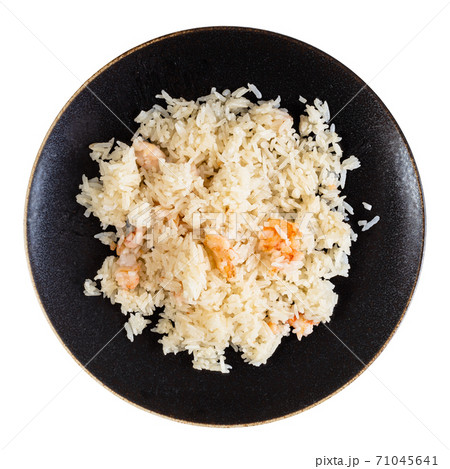 top view of boiled rice with shrimps on plate 71045641