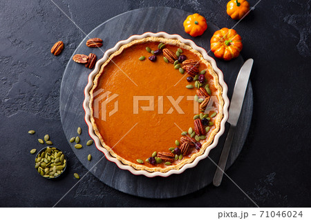 Pumpkin pie on marble board. Grey background. Close up. Top view. 71046024