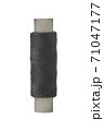 Bobbin of black cotton thread on white background 71047177