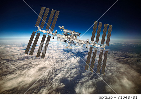 International Space Station over the planet earth. International Space Station over the planet earth. 71048781