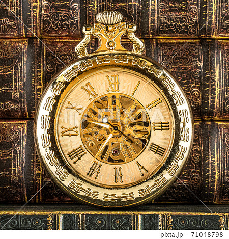 Antique clock dial close-up. Vintage pocket watch. 71048798