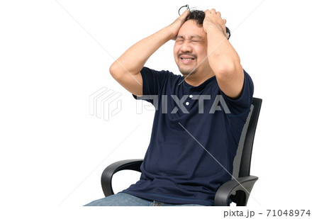 middle aged man stressed or confused. middle aged man stressed or confused. 71048974