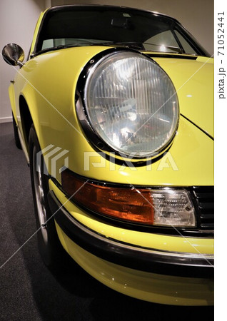 Close up of sports car headlight and indicator Close up of sports car headlight and indicator 71052441