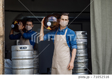Male work in brewery during coronavirus quarantine Male work in brewery during coronavirus quarantine 71052516