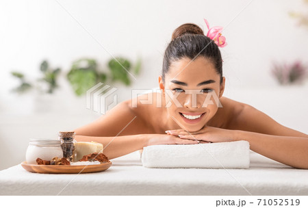 Beautiful Asian Lady Enjoying Beauty Treatments With Natural Cosmetics At Spa Beautiful Asian Lady Enjoying Beauty Treatments With Natural Cosmetics At Spa 71052519