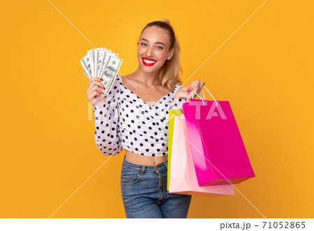 Lady holding shopping discount bags