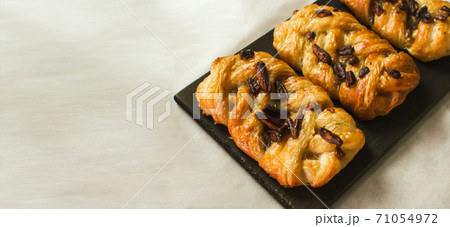 Danish pastry maple pecan with nuts and maple syrup.Space for text. banner. 71054972