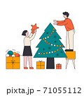 Young beautiful couple decorate Christmas tree with lights, stars, toys. Gifts under christmas tree. 71055112