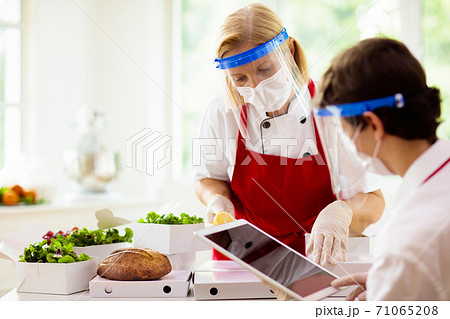 Food takeaway during coronavirus outbreak. Food takeaway during coronavirus outbreak. 71065208