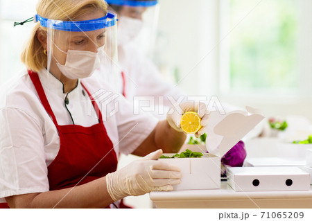 Food takeaway during coronavirus outbreak. 71065209