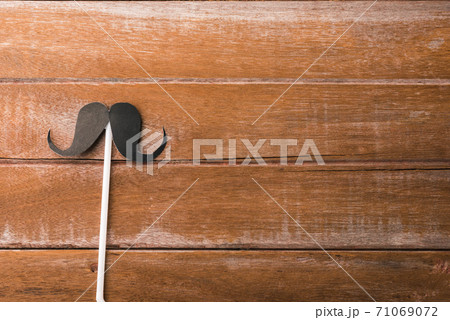 Black mustache paper on wooden Black mustache paper on wooden 71069072