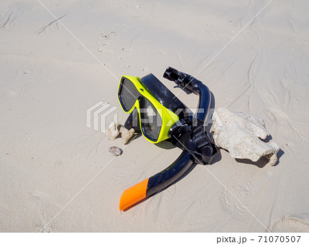 Snorkel on white sand beach background, Enjoy snorkeling Tour on your holidays Snorkel on white sand beach background, Enjoy snorkeling Tour on your holidays 71070507