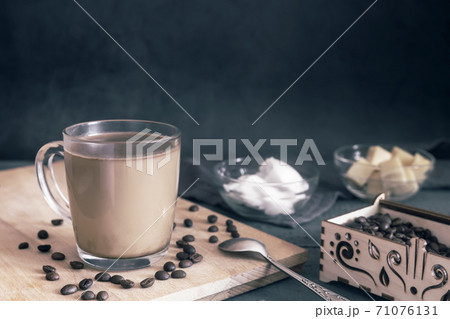 Bulletproof coffee: coffee whipped with cream and coconut oil. Bulletproof coffee: coffee whipped with cream and coconut oil. 71076131