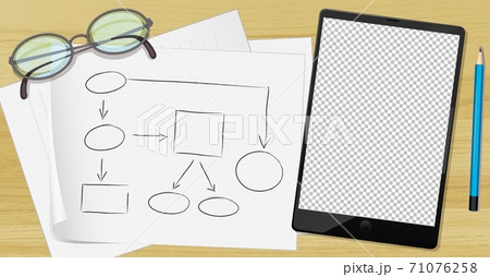 Tablet and paper on the table 71076258