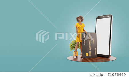 Smiling young female with credit card at her home. 71076440