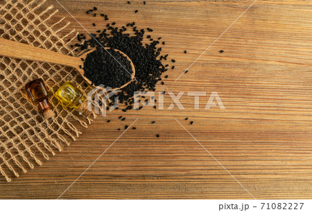 Black Cumin, Nigella Sativa or Black Caraway Seeds Essential Oil 71082227
