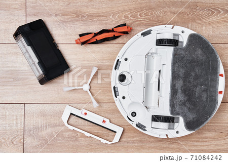 Repair robot vacuum cleaner, closeup. Household appliance service 71084242
