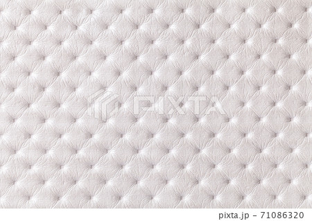 Texture of white leather background with capitone pattern, macro. Texture of white leather background with capitone pattern, macro. 71086320