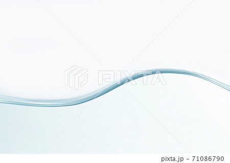 Close up water splash with air bubbles. Fresh and clean surface aqua flowing in wave and clean water on white background isolated. Advertising image with free space for your work Close up water splash with air bubbles. Fresh and clean surface aqua flowing in wave and clean water on white background isolated. Advertising image with free space for your work 71086790
