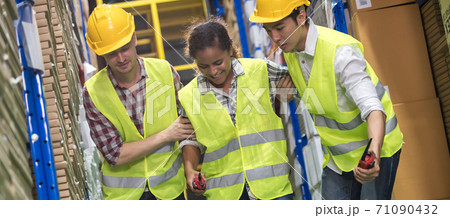 Warehouse worker help colleague first aid after accident panorama Warehouse worker help colleague first aid after accident panorama 71090432