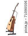 Acoustic guitar with stand isolated on white background 71090506