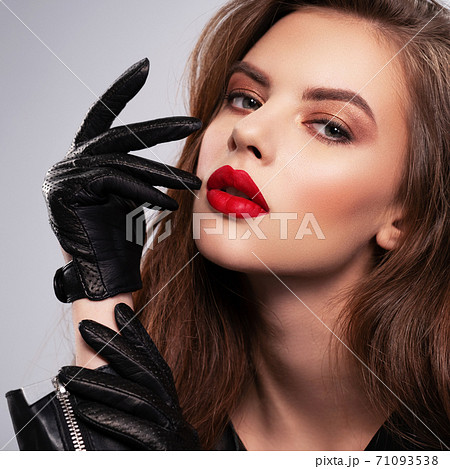 Portrait of beautiful young woman with bright... - Stock Photo [71093538] -  PIXTA