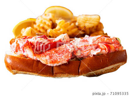 Fresh Maine lobster roll with waffle fries Fresh Maine lobster roll with waffle fries 71095335