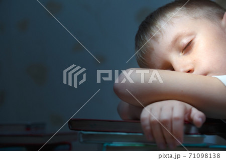 Boy fell asleep for school lessons. Boy fell asleep for school lessons. 71098138