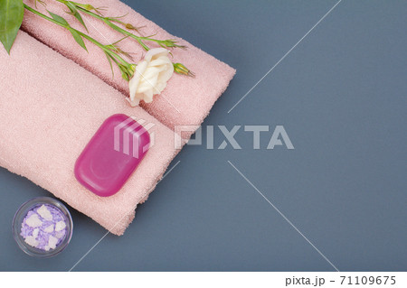 Spa products for facial and body care. Sea salt, soap and towel. 71109675