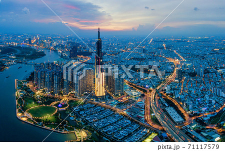 Aerial cityscape of Saigon at beautiful nightfall sky in evening Aerial cityscape of Saigon at beautiful nightfall sky in evening 71117579