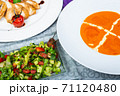 Top view of a restaurant table served with a multi-course set lunch and drink. Complex lunch. 71120480
