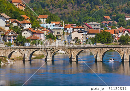 Old Bridge on Drina river in Visegrad - Bosnia and Herzegovina 71122351