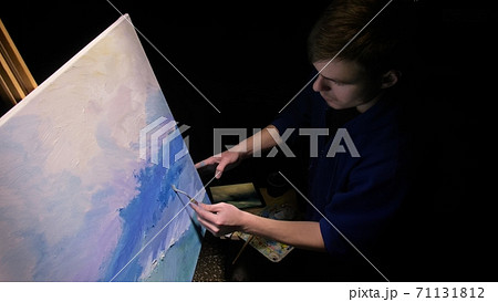 Artist copyist paint seascape with ship in ocean. Craftsman decorator draw as boat sail on blue sea with acrylic oil color. Artist copyist paint seascape with ship in ocean. Craftsman decorator draw as boat sail on blue sea with acrylic oil color. 71131812