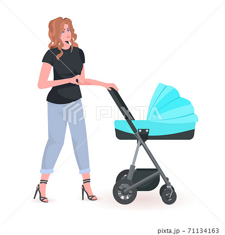 young mother walking with newborn baby in stroller motherhood concept full length 71134163