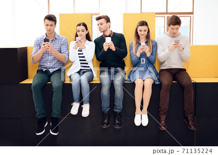 Group of creative developers testing application. Group of creative developers testing application. 71135224