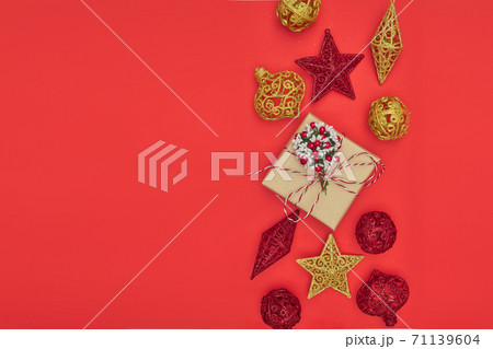 Merry Christmas postcard banner, decorations on red background, copy space 71139604