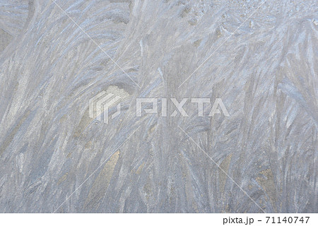 ice patterns on frozen window 71140747