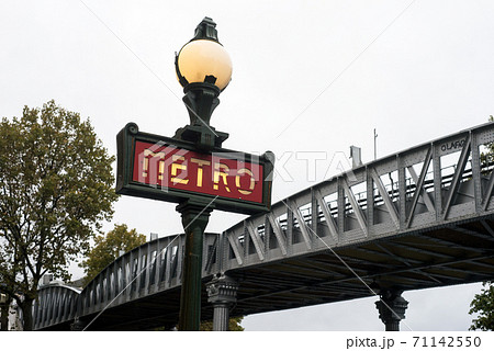 Paris - France - 25 October2020 - View of the famous metropolitan sign on aerial metro background 71142550