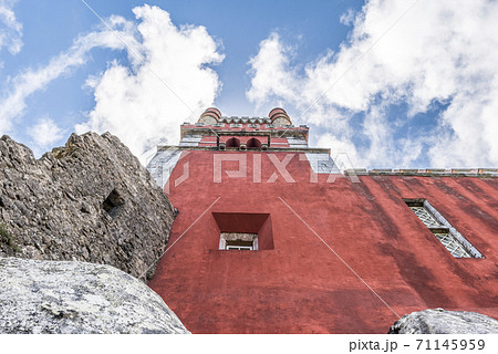 The red wall on the rock in the Pena National Palace in Sintra town, Portugal The red wall on the rock in the Pena National Palace in Sintra town, Portugal 71145959