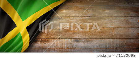 Jamaican flag on vintage wood wall banner 71150698
