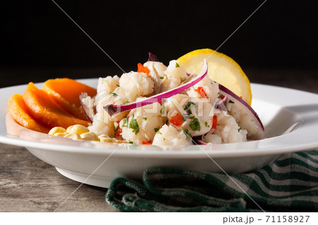Traditional peruvian ceviche with fish, sweet potato, corn and vegetables Traditional peruvian ceviche with fish, sweet potato, corn and vegetables 71158927