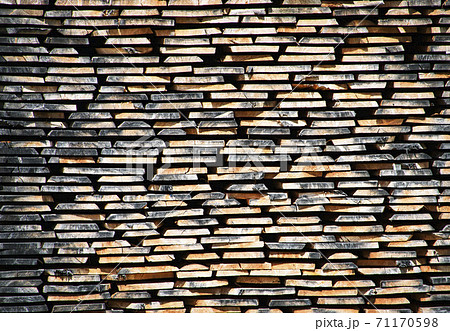 stacked dried wooden boards 71170598