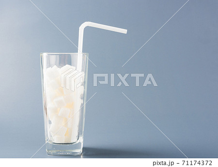 glass full of white sugar cube sweet food glass full of white sugar cube sweet food 71174372