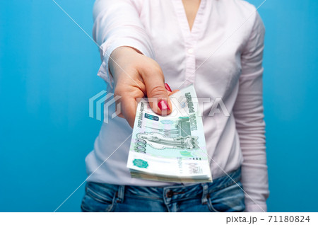 Hands of an unidentified woman with red manicure Hands of an unidentified woman with red manicure 71180824