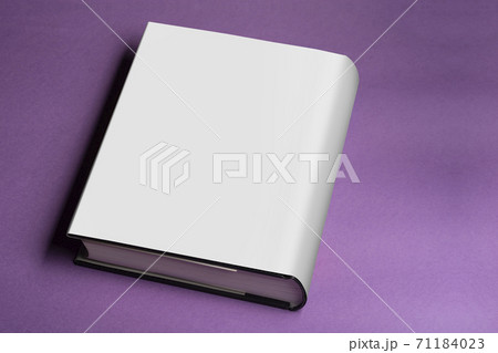 Thick book with blank cover on purple background mock-up series 254 71184023
