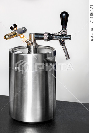 New clean stainless steel red wine barrel on the bar, the subject in focus. 71186421