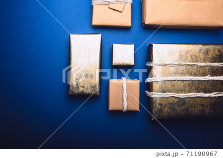 Eco friendly gifts wrapped in brown paper Eco friendly gifts wrapped in brown paper 71190967